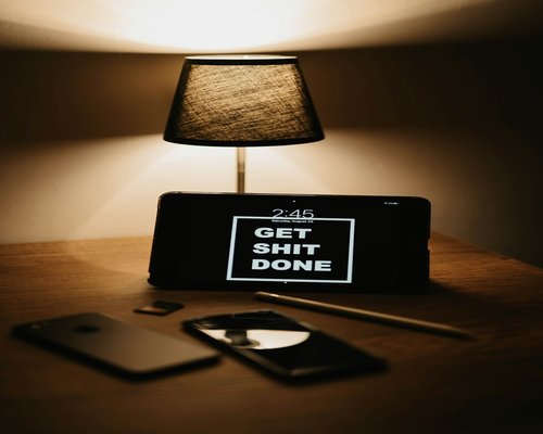 A tablet screen displaying clean digital text with reduced bright levels to match comfortable room lighting